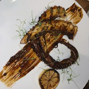 Octopus appetizer  Big portion size  Tasty