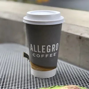 a cup of coffee and an avocado