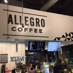 a sign above the counter