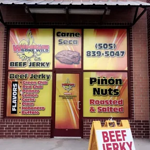 a sign in front of a restaurant