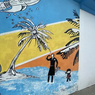 a man and a woman on the beach