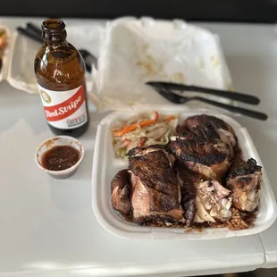 Got the Family Meal (2 for $22). Red Stripe Jamaican beer. The sauce has a nice immediate kick as soon as you try it. Loved it!