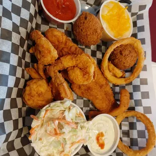 Fried catfish, shrimp, onion rings, coleslaw, and grits $13.99