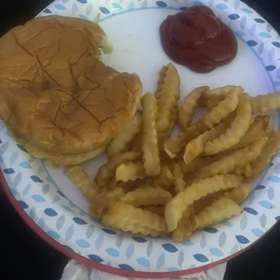 CHEESEBURGER all the way (with a bite taken out) with FRY