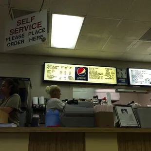 ows a customer at a fast food restaurant