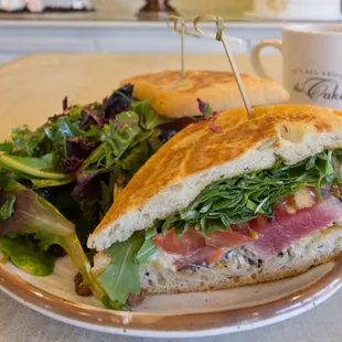 Seared Ahi  AAA sesame-seared Ahi, capers, arugula, tomatoes &amp; lemon caper remoulade