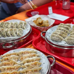 Traditional dumplings (steamed and fried), beef dumplings and kimchi dumplings.