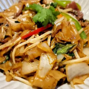 Drunken noodles, very nice good smoky flavor, adequate amount of Thai basil. Well balanced sweet and Salty.  Good job