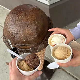 Coffee and peanut butter ice cream and coffee with a diff cup of strawberry ice cream