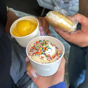 Mango sorbet, snickerdoodle ice cream sandwich, butter pecan ice cream with rainbow sprinkles