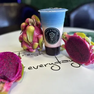 a dragon fruit and a cup of tea