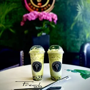 two cups of tea on a table