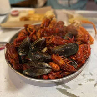 We did mussels , crawfish , and snow crab platter.