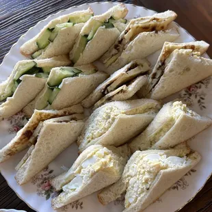 sandwiches: cucumber, cheese and pickled something, and egg salad