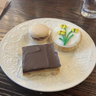 a plate of desserts on a table