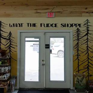 a woman standing in front of a store