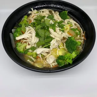 a bowl of chicken and broccoli