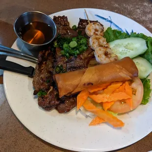 44. Tom Suon Bo Nuong Cha Gio Charbroiled marinated beef short ribs, shrimp, egg roll