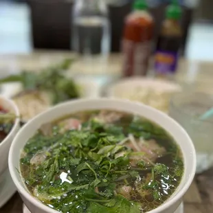 a bowl of soup and a plate of food