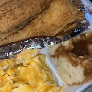crispy and delicious fried fish with succulent cheesy savory mac &amp; mashed potatoes!