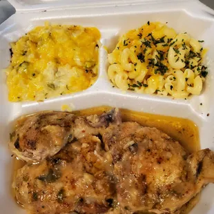 Smothered baked chicken, broccoli and cheese casserole and Mac and cheese.