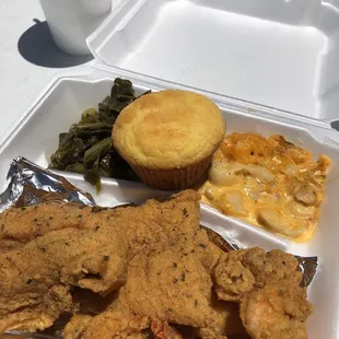 Shrimp and fish plate with greens and mac n cheese