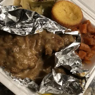 Smothered pork chops, yams, cabbage