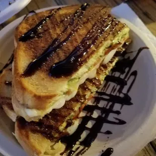The Pope HOUSE MADE PESTO, TURKEY, SLICED TOMATOES, MOZZARELLA &amp; BALSAMIC REDUCTION DRIZZLE