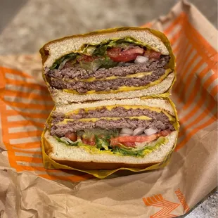 Double Cheeseburger with lettuce, tomato, onions, pickles, mustard, and mayo!