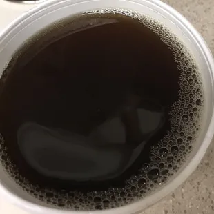 a cup of black liquid