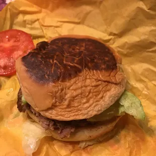 a hamburger and a tomato