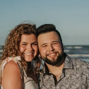 a man and a woman on the beach