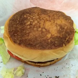 Appetizing, huh! Not to me! Over toasting of the bun and nothing close to the photos from the pro photo shoots.