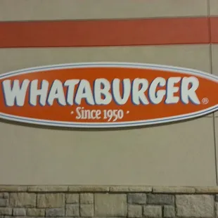 a sign for whataburger since 1989
