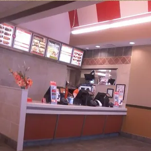 Menu is very visible above the counter