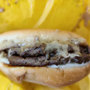 Mushroom Swiss Burger has two patties, layered with cheese and sauteed mushrooms