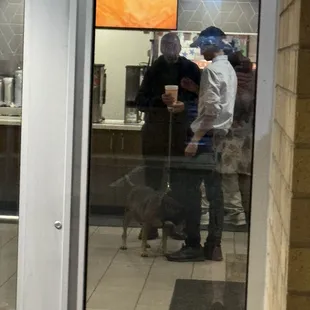 The manager coming out from behind the counter and was bent over petting the dog!!! GROSS, make someone else&apos;s food after, not mine!