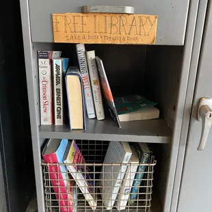 There&apos;s even a small take/ five library!