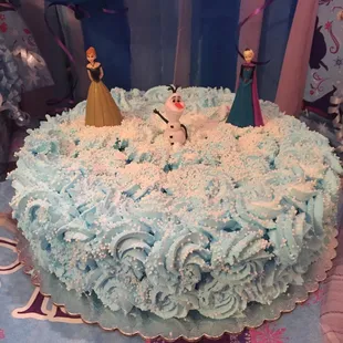 Disney Frozen Cake. With whipped frosting and strawberry filling.