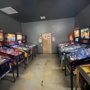 a row of pinball machines