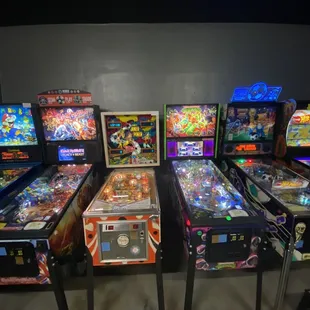 a row of pinball machines