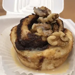 Cinnamon bun with walnut and a delicious  sugary glaze.