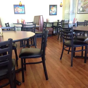a restaurant with tables and chairs