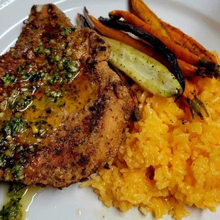 Fried porkchops, roasted organic carrots and Achiote rice