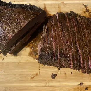  sliced steak on a cutting board