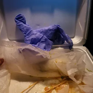 a plastic container with food in it