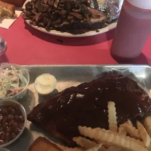 Saturday's Specials Prime Rib with mushrooms and BBQ ribs Half Rack- meat fell off bones. Thanks for your recommendation, Tiana
