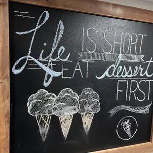 a chalkboard with a quote on it