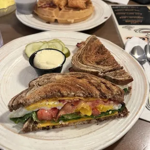Chicken and waffles and breakfast sandwich