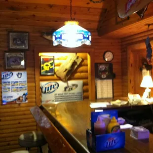 a bar with a television in the background